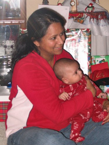 Watching Bella unwrap presents.
