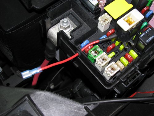 Wire passed through and new connector crimped on.  Fuse tap is ready to replace the M6 20A fuse.  I chose this one because it's powered only when the van is on.  This fuse is for the #1 ignition switched power plug and rain sensor...our van doesn't have a rain sensor so it's got power to "spare"...heeheehee.
