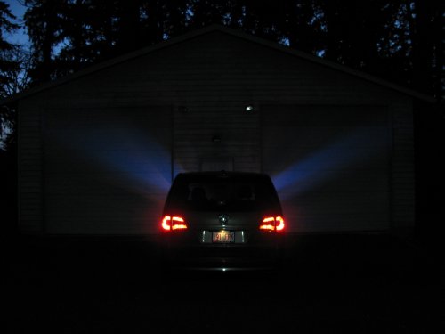 This shows just how much the head lamps are angled on top.  The left side has the LED array far back (towards the engine) whereas on the right side I wasn't as accurate and the LED array is about 3mm-5mm more forward (away from the engine).  This clearly shows how the lip on the head lamp disburses the light.  The left side is what I was originally looking for so I should've been more patient when installing the right side.  Experience gained.
