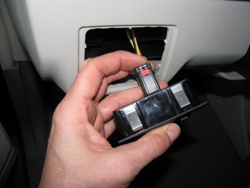 ...and now it's in the 'locked' position. I noticed many of the electrical connectors had some sort of lock on them. If you see a red tab/button then that's a connector lock. 
