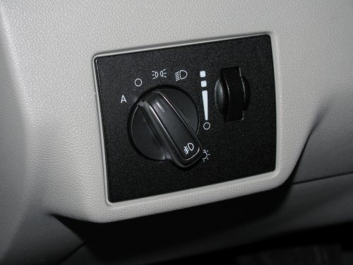New fog-light equipped light switch.  To operate simply push the dial in.  Of course, you have to go to the *&$%! dealership to get it 'enabled'!  Fogs automatically turn off when high beams are turned on, however, they remain on when using the "flash to pass" feature.  Also, the 'system' remembers the position of the fogs so if you leave them on when you turn off the lights, they will automatically come back on when you turn the lights back on, including if you turn off the car.
