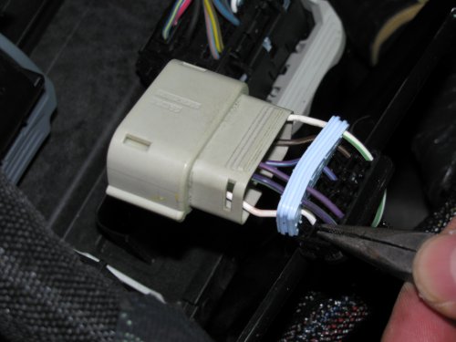 Using needle-nosed pliers remove the tits from inside the plug backing for the #16 and #11 holes.  Don't remove the others as they fill the holes in the seal.
