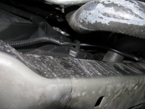 Fog harness using a hook on the right side radiator fan surround.
