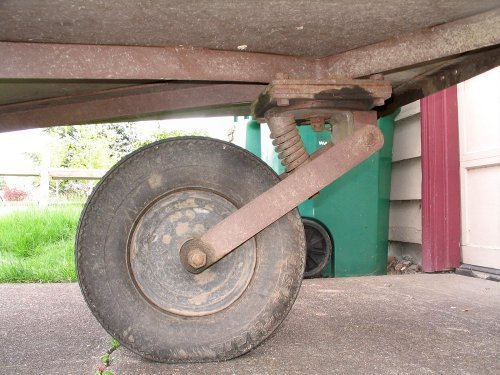 The single-wheel.  For those not familiar with this type of trailer, the wheel assembly is on a pivot, just like the front wheel on a shopping cart i.e. a castor (wheel).  Since I backed the trailer in the driveway the castor is further under the trailer.  When I pull the trailer forward, the castor will pivot 180-degrees, thus placing the castor further rearward.  Learn more here:  [url=http://www.singlewheel.com/]http://www.singlewheel.com/[/url]
