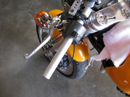 Raw handle bar.  Removing the left side is easy.  Squirt some Windex(R) under the grip to help loosen its "grip" and make it easier to slip off.
