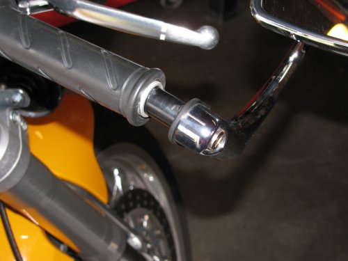 To remove, simply loosen the bolt a few turns and pull the whole assembly out.
