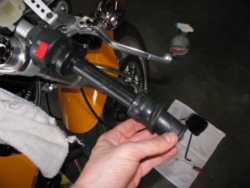 Slide/peel the stock grip off.
