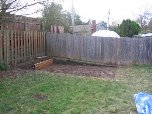 I removed the sod layer and two shovel widths to depth over the course of a rainy week and my back said, "Screw you!"  So I hired a local site prep. contractor and he excavated the rest of the site for me in a couple hours.  

