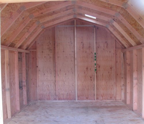 Looking through the door.  I used a paintable, gray sealer where the roof meets the walls, the air vents, and around the door to reduce the infiltration of bugs and drafts.  I also put a perimeter of compressible foam weatherstriping around the door to further close up gaps.
