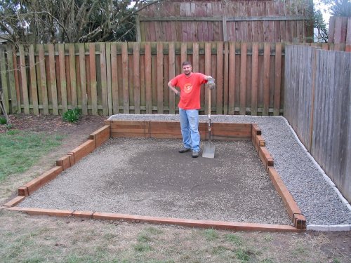 Two yards of -3/4, tamped down with a gas-powered tamper, and the base is ready for the shed...and my back and I are DONE!
