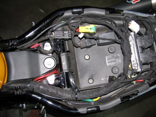 Space is now available.  I'll be using this to house my Dynojet PowerCommander III.
