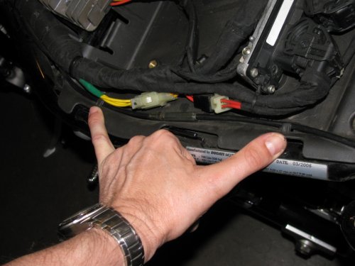 The cable for the seat release is held in by two very simple compression clips.  The cable will pull straight out...
