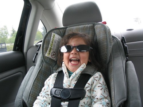 Bella wearing mommy's sunglasses on the way to Cannon Beach.
