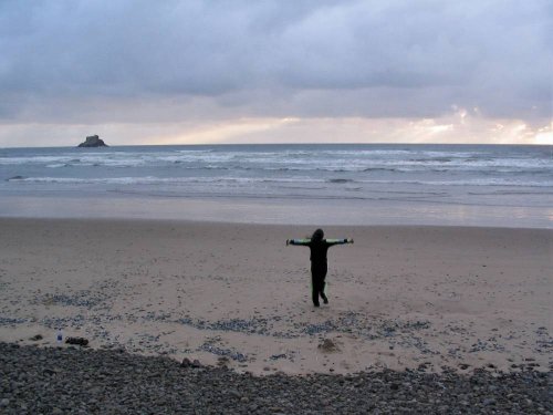 Antonette running out to hug the ocean.
