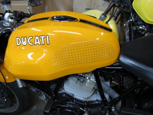 Here's the StompGrip on the tank.  The adhesive backing is 3M and it is sticky!  So get everything lined up, triple checked, then peel the backing off.  Place the StompGrip inbetween the marks and get it right the first time because the stuff is STICKY!
