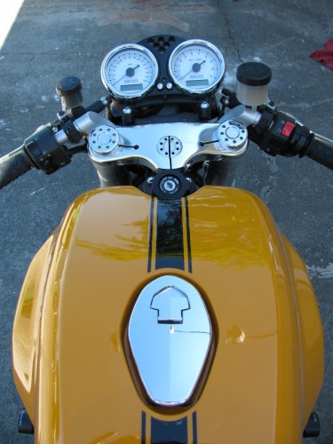 After...
Now the gauge faces upward a little bit more thus allowing the rider (me) to view them better.  A more direct, heads-on view.
