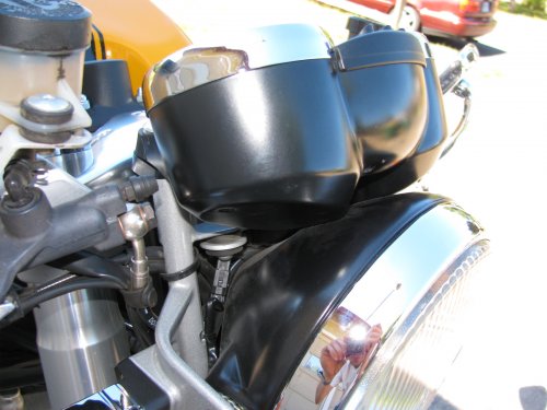 The gauges ever so slightly touch the headlight bucket.
