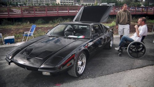 '72 DeTomosa Pantera.  The gentleman in the wheel chair is the owner.  The car is equipped with hand controls.
