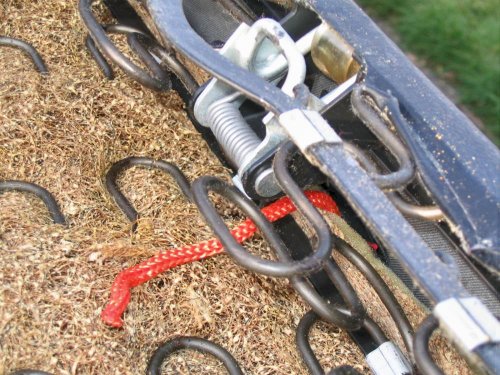 Line pulled through.  Original pull strap can be seen around latch.  Typically the strap will break but leave the loop part intact.
