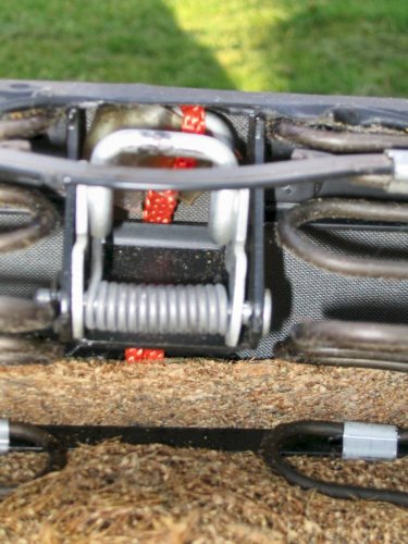 If the original strap loop is intact you can loop the line through it.  In my case I decided to loop it through the loop and over the latch.
