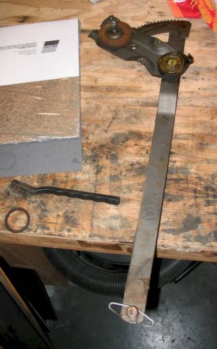 What the window lifter looks like with locating spring attached at bottom.
