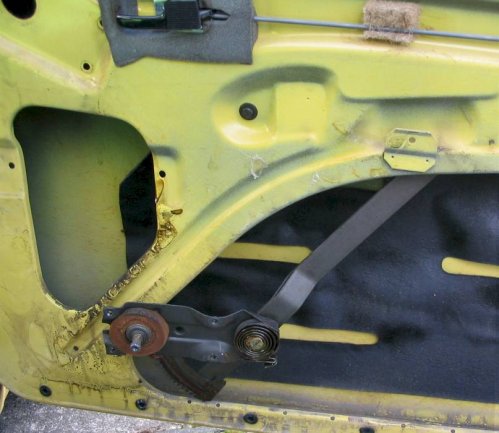 Bring winding mechanisim down and keep window glass up.
