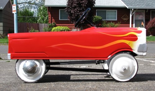 All four wheels have hub caps but the a couple of the tabs broke off the front wheel, not leaving enough to hold the hub cap on.  So I flipped the wheels around.  I may do the same for the rears...not sure.
