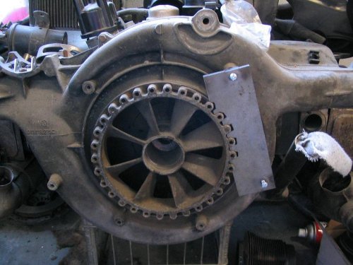 My original pulley lock that I got a previous mechanic to whittle out of steel for me.  It's rough but it still serves me well to this day.  This is what inspired me to design the newer version, using [url=http://www.emachineshop.com/][u]www.emachineshop.com[/u][/url] CAD software and manufacturing.
Though it can be used with the engine out of the car, it makes the job [b]much easier[/b] when the engine is in the car and the pulley fan needs to be removed.
