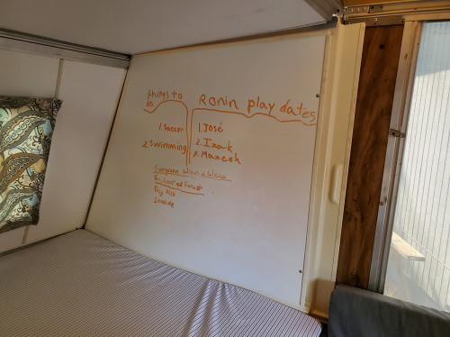Dry-erase side walls on "kids" bed end.

