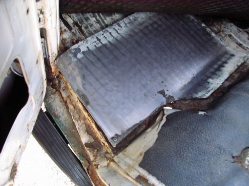 Previous owner "patch" job, left front footwell.
