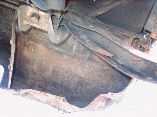 Looking at the right side, underside, main battery area.
